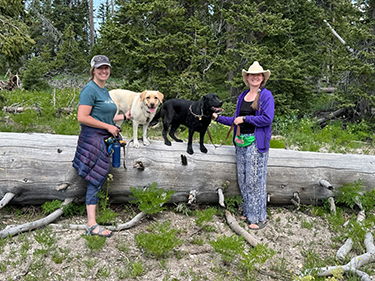Terena and Friend with Yellow and Black Labs